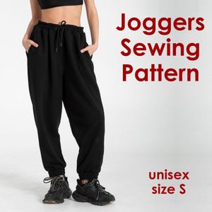 May include: Black joggers with an elastic waistband, a drawstring, and side pockets. The text on the right reads Joggers Sewing Pattern and unisex size S. The garment features cuffed ankles and a loose fit, paired with black athletic sneakers.