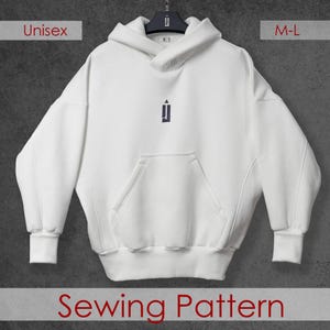 May include: A white unisex hoodie with a kangaroo pocket and a hood. The hoodie has a small navy blue logo on the chest and the text "Sewing Pattern" at the bottom. The size is M-L.