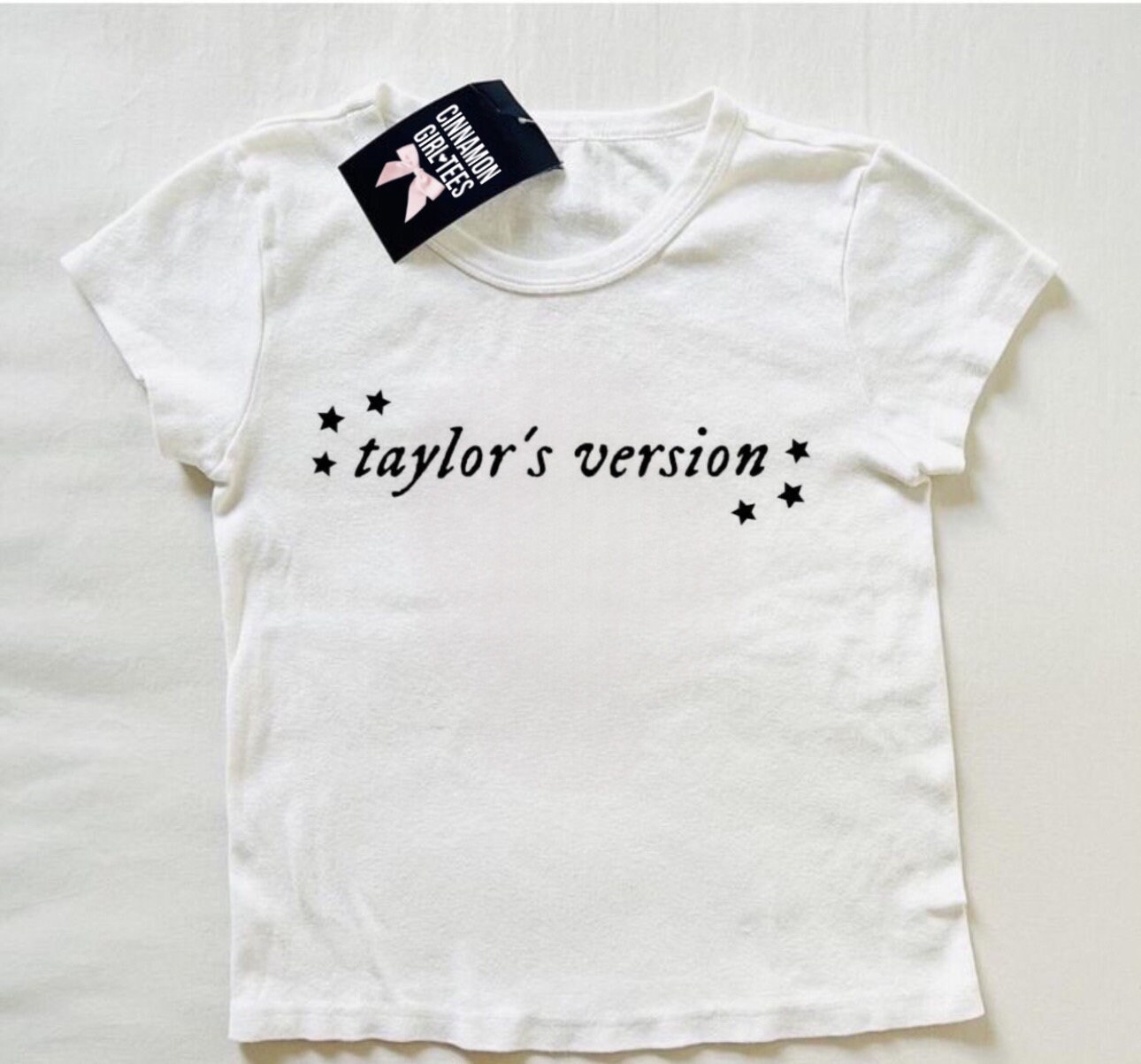 Discover Taylors Version baby tee, the eras tour baby tee