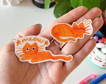 おもしろオレンジ色の猫の手作りステッカー - 防水・耐久性のある光沢のあるビニールステッカー