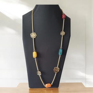 Long Gold Chain Necklace: Colorful Beads and Floral Accents