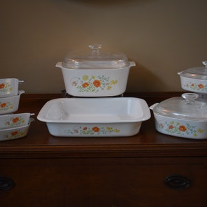 Vintage 11 Piece Corning Ware Wildflower Set with A-21 Roasting Pan, 2x P-41-B, 2x P-43-B, 1xA-1-B W/Lid, 1x A-2-B W/Lid, 1x A-5-B W/Lid.