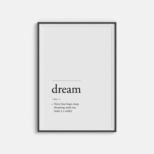Puede incluir: Arte de pared imprimible en blanco y negro con la palabra "dream" en negrita y una definición: "Nunca pierdas la esperanza, sigue soñando hasta que lo hagas realidad."