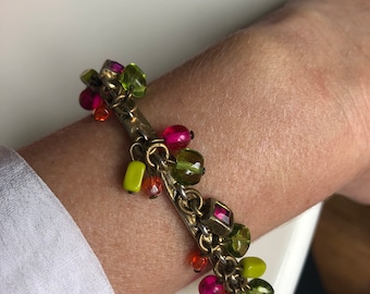 Very pretty vintage bracelet, semi-rigid, gold with pink, green and orange pearl charms from the Sophie Goetsch Paris brand, pretty bracelet