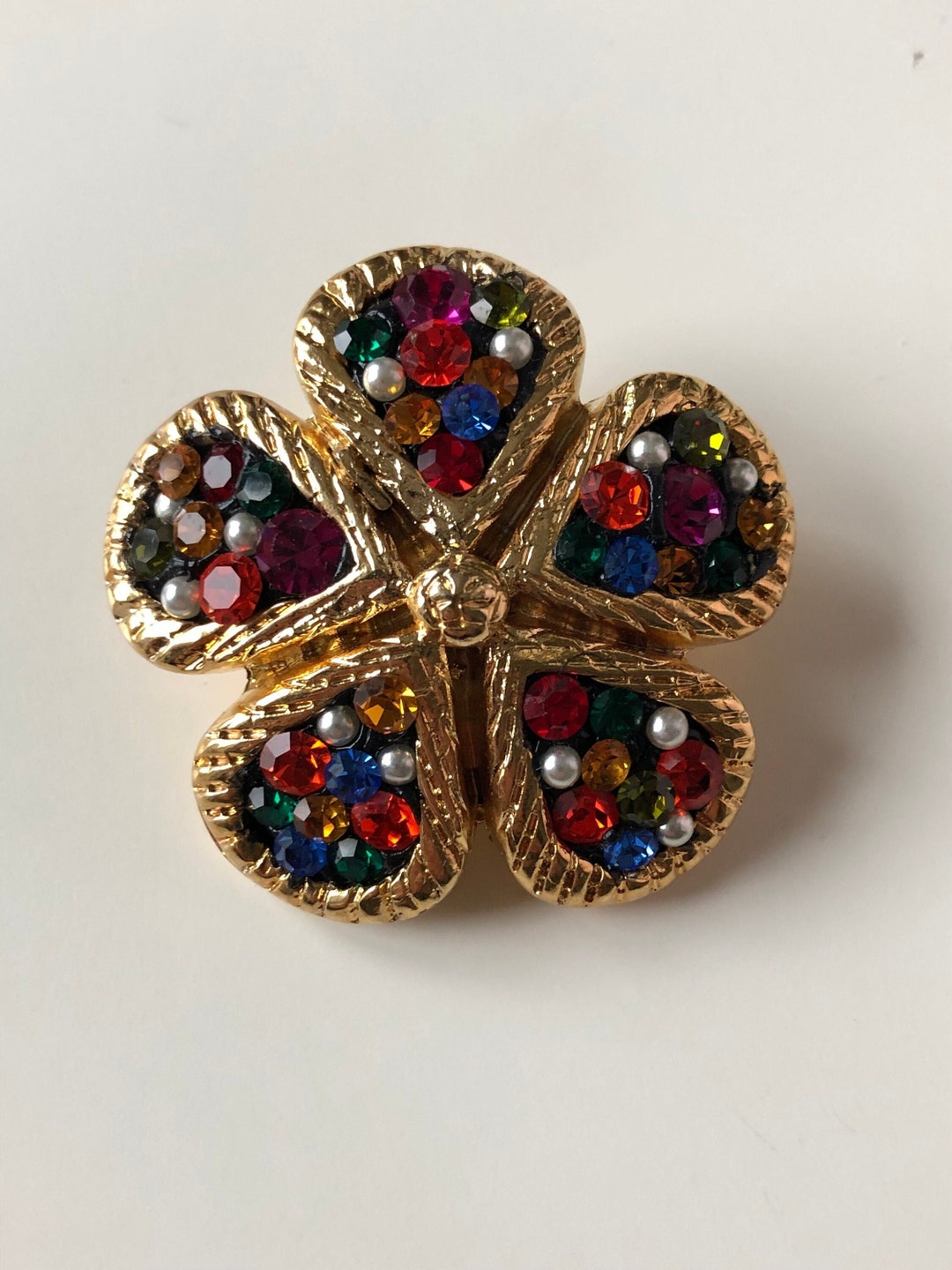Broche métal doré fleur - Canada