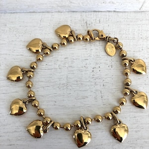 Agatha Paris, very pretty gold bracelet with heart charms from the famous French brand, Agatha heart charm bracelet, women&#39;s gift