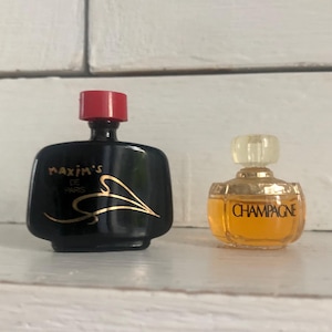 Raro: miniatura de eau de toilette Champagne de Yves Saint Laurent y miniatura de eau de parfum Maxim&#39;s de Paris, 2 miniaturas de perfume