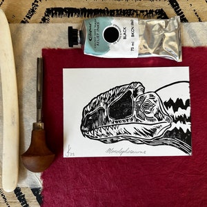 Monolophosaurus dinosaur hand drawn hand carved hand printed lino relief print