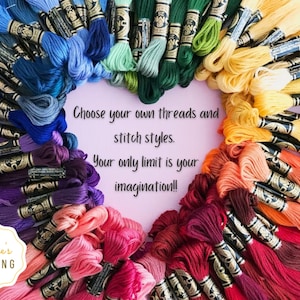 May include: A heart-shaped arrangement of colourful embroidery floss spools. The spools are arranged in a rainbow pattern, with the colours transitioning from blue to red. The text "Choose your own threads and stitch styles. Your only limit is your imagination!!" is written in white on a pink background in the centre of the image. The text "Seese's SEWING" is written in white on a black circle in the bottom left corner of the image.
