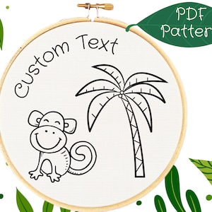 May include: Black and white embroidery pattern featuring a monkey and a palm tree. The pattern is on a white background and includes the text "Custom Text".