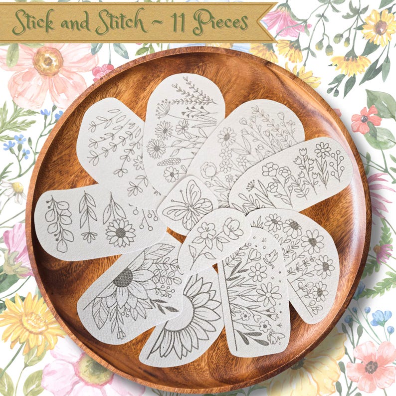 set of 11 floral stick and stitch designs on a wooden plate