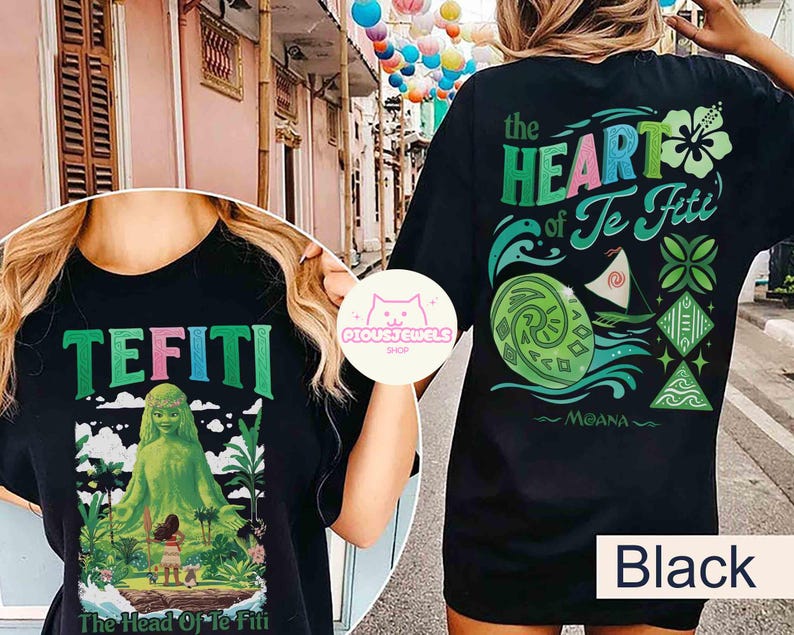 May include: Black t-shirt featuring the text "TEFITI" in green and pink, with a graphic of a green figure and a girl. The back of the shirt has the text "the HEART of Te Fiti" with Moana-themed graphics.