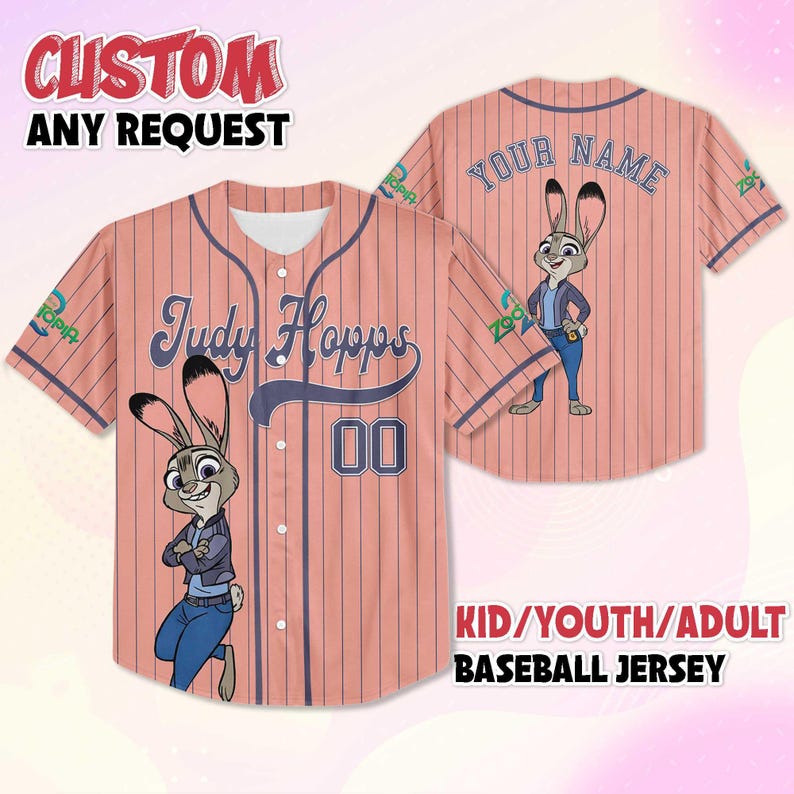 May include: A baseball jersey with a pink and navy blue pinstripe design. The front features the name "Judy Hopps" and the number "00", along with a cartoon character. The back has the text "YOUR NAME" and a cartoon character. The text "CUSTOM ANY REQUEST" and "KID/YOUTH/ADULT BASEBALL JERSEY" are also visible.