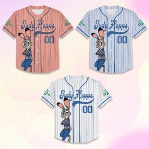 May include: Three baseball jerseys featuring the character Judy Hopps from Zootopia. The jerseys are in coral, light blue, and white, each with vertical stripes. The character is depicted on the front, with the name "Judy Hopps" and the number "00".