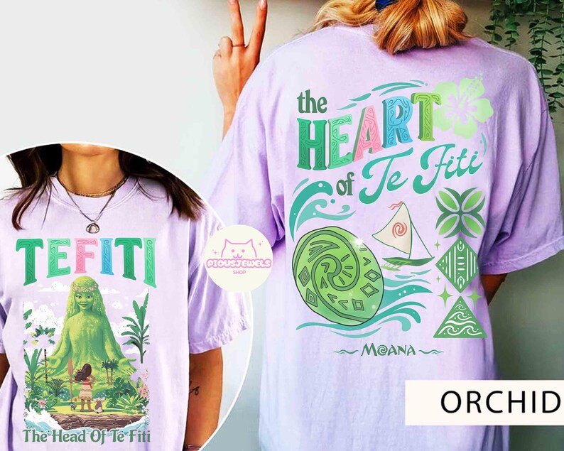 May include: Orchid-colored t-shirts with graphics from the animated film Moana. One shirt features the text "TEFITI" and an image of the character Te Fiti. The other shirt displays "the HEART of Te Fiti" with Moana-themed illustrations.
