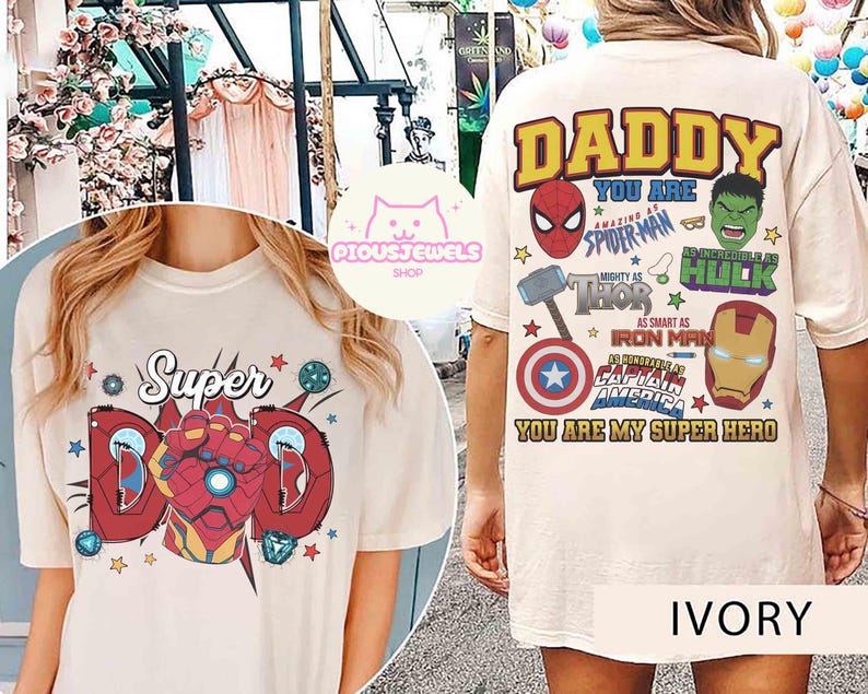 May include: An ivory t-shirt featuring a front graphic of a red armored gauntlet with the text Super Dad and a back graphic with the text DADDY YOU ARE AMAZING AS SPIDER-MAN INCREDIBLE AS HULK MIGHTY AS THOR SMART AS IRON MAN HONORABLE AS CAPTAIN AMERICA.