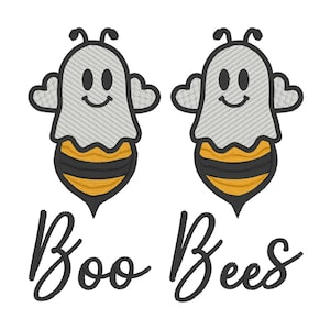 May include: Two embroidered designs of a ghost-bee hybrid. The ghost is white with a gray striped pattern, and the bee has yellow and black stripes. The text "Boo Bees" is written in black cursive below the images.