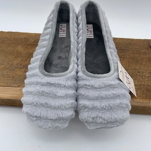 Very soft light gray slippers