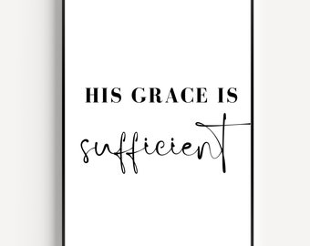 May include: A framed print with the words "HIS GRACE IS sufficient" in black lettering on a white background. The top line is in a bold, sans-serif font, while the word "sufficient" is in a cursive script.