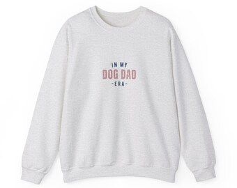 May include: A gray sweatshirt with the text "IN MY DOG DAD -ERA- " printed on the front in pink and blue.