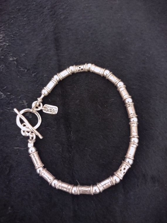 Unique sterling silver bead and barrel bead bracel