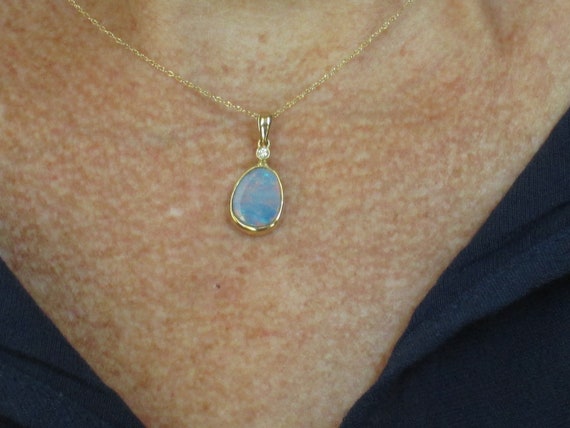 14k gold opal and diamond pendant - image 1