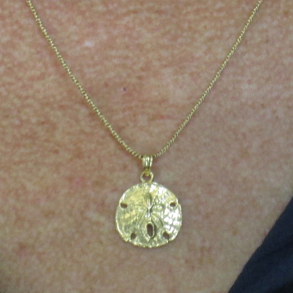 14 k gold sand dollar solid pendant with fancy chain 17 inches