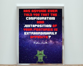 May include: A framed print with a dark blue background with white stars. The print features a red and white text quote that reads "HAS ANYONE EVER TOLD YOU THAT THE CONFIGURATION AND JUXTAPOSITION OF YOUR FEATURES IS EXTRAORDINARILY APPOSITE?" with the signature "Kryten, Camille."  A green alien-like creature is in the bottom center of the print.