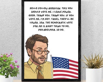 May include: A framed print featuring a cartoon illustration of a man with brown hair, a beard, and glasses, wearing a yellow checkered shirt and brown tie. Next to him is a small American flag. The text reads: HELLO FELLOW AMERICAN. THIS YOU SHOULD VOTE ME. I LEAVE POWER. GOOD. THANK YOU. THANK YOU. IF YOU VOTE ME, I'M HOT. TAXES, THEY'LL BE LOWER. SON. THE DEMOCRATIC VOTE FOR ME IS RIGHT THING TO DO, PHILADELPHIA. SO DO.