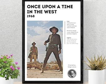 May include: A movie poster for the 1968 film "Once Upon a Time in the West". The poster features a black and white photo of two men in the desert, one standing and one sitting. The poster also includes the film's title, release year, cast, director, and tagline.