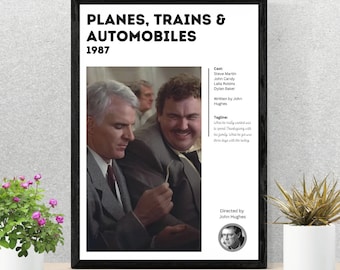 May include: A movie poster for the 1987 film Planes, Trains & Automobiles. The poster features a black and white photo of Steve Martin and John Candy. The text on the poster reads "Planes, Trains & Automobiles" and "1987".