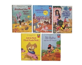 May include: A collection of five vintage Disney storybooks. Titles include "Sindbad the Pearl Diver," "The Aristocats Get Into Mischief," "The Princess Who Never Laughed," "All Is Well That Ends Well," and "Ali Baba and the 40 Thieves."