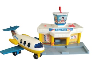 Zabytkowy samolot i lotnisko Fisher Price Jetport z lat 80.