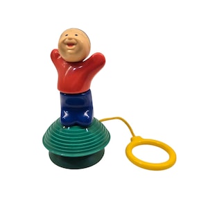 Vintage 1970&#39;s Johnson & Johnson Baby Toy Pull Cord Boy with Suction Cup