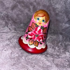 vintage Russian doll. single doll with internal chime. Roly-poly doll. matryoshka baboushka. colourful handpainted. wooden treen