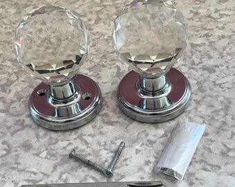 Tahari Home faceted glass mortice door knobs with a polished chrome base and diamond design