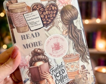 May include: Clear phone case with a design featuring coffee cups, coffee beans, and illustrations of women reading. The case includes the text "READ MORE" and "Fueled by Iced Coffee & Unstoppable Chaos."
