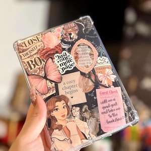 May include: Clear phone case with a collage design featuring a butterfly, flowers, and text. The case includes a cartoon image of a woman and various phrases like "Just one more page" and "call me a good girl and take me to the bookstore."
