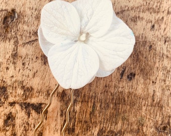 White hydrangea bun pick bridal wedding boho chic bridal hairstyle