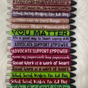 Glitter refillable pens.  Social work, mental health.