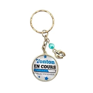 uncle&#39;s key ring in progress.... please wait; birth announcement