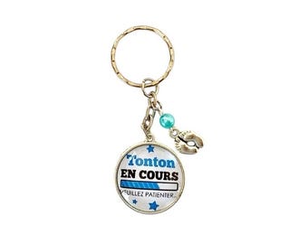 uncle&#39;s key ring in progress.... please wait; birth announcement
