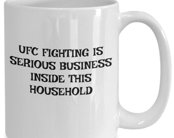 Ufc fighting in this household gloves head kicks weight divisions gift mug cup coffee tea fights tonight kit shorts island fighting equip...