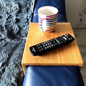 Noble coffee table tray in any size made of solid wood. Continuous slats, beech or oak 19-20 mm. 30 cm long and 12 cm high, 14-39 cm wide