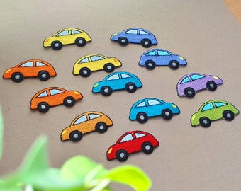 May include: Ten embroidered iron-on patches of cartoon cars in various colors, including yellow, orange, red, blue, green, and purple. The cars are all facing the same direction and have a simple design.
