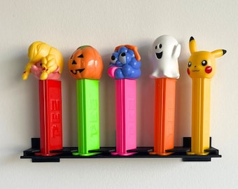ペッツ　PEZ ディスペンサー　34本まとめてセット PEZディスペンサー 11個セット - メルカリ