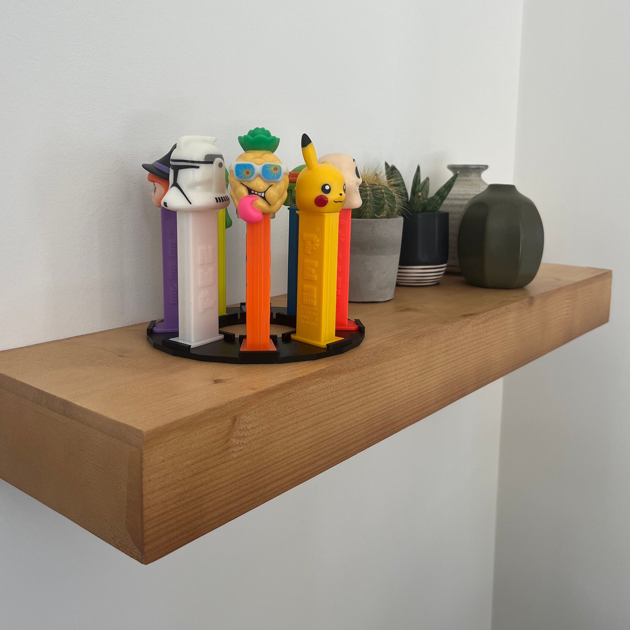 Circular Pez Display Stand holds 8 Footed Dispensers Pez Display Case