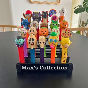 Pez Dispenser Stadium Display Stand, Display Case Holds 25 Footed Pez Dispensers. Modular and Customizable Pez Dispenser Display