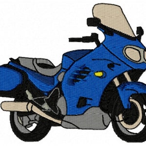 May include: A blue motorcycle with a windshield and a side bag. The motorcycle has a black seat and black wheels.