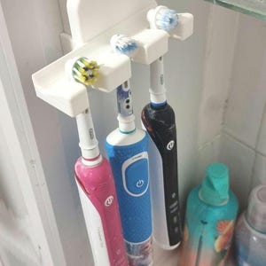 Suporte/suporte para escova de dentes Oral B